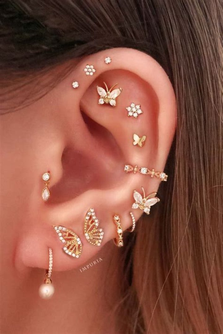 15 Pretty Ear Piercings That'll Inspire You To Add More Studs, Stat