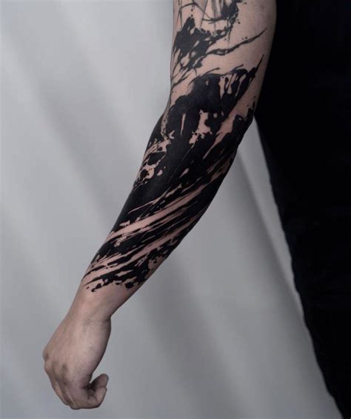 25 blackout tattoo design ideas for men and women Legit.ng