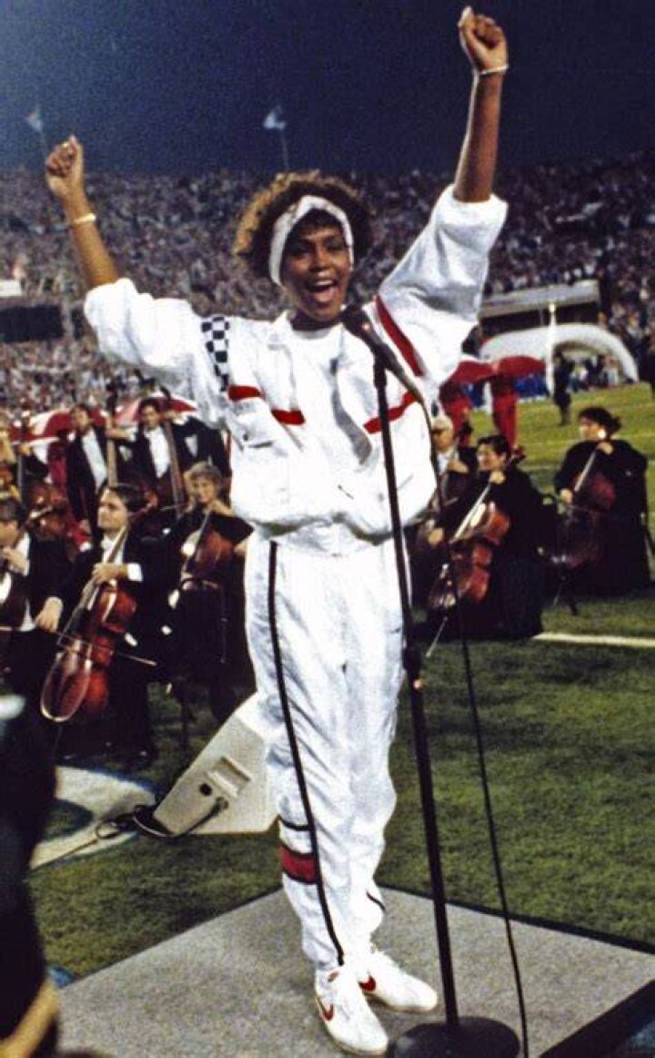 7 Iconic Whitney Houston Looks That You'll Never Forget