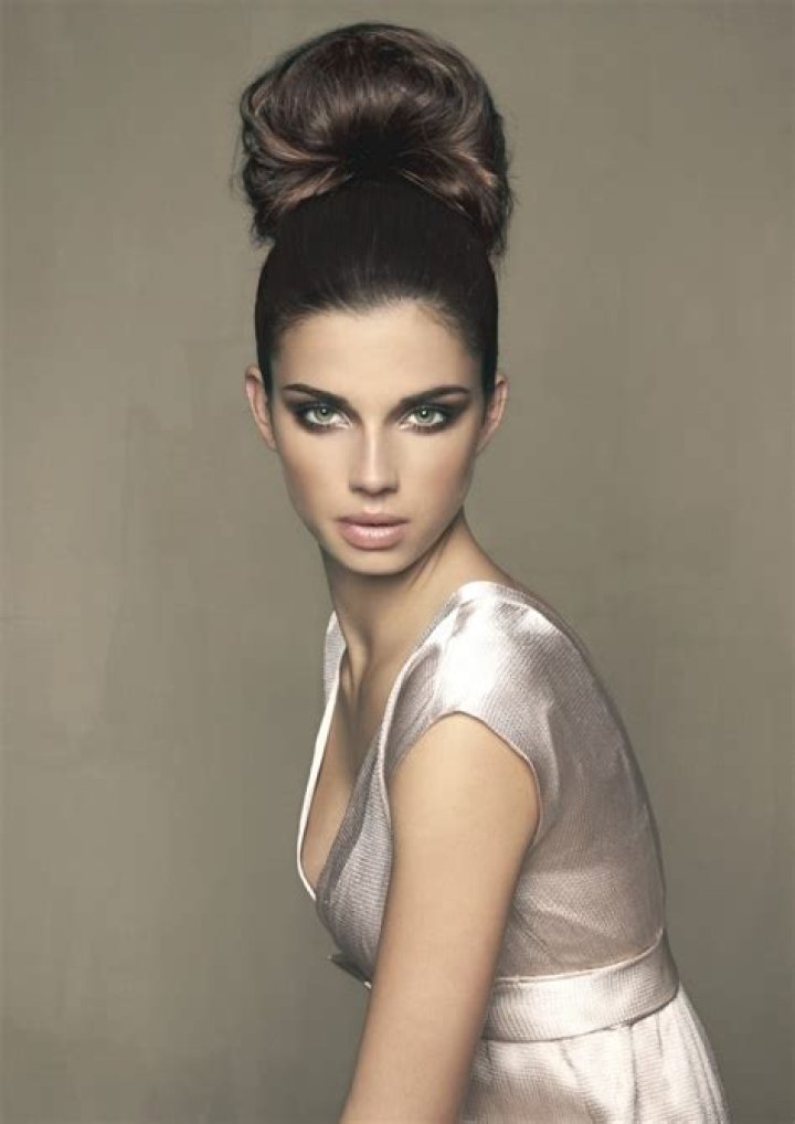 Alluring Updo hair sophistication at its best. High Bun Hairstyles