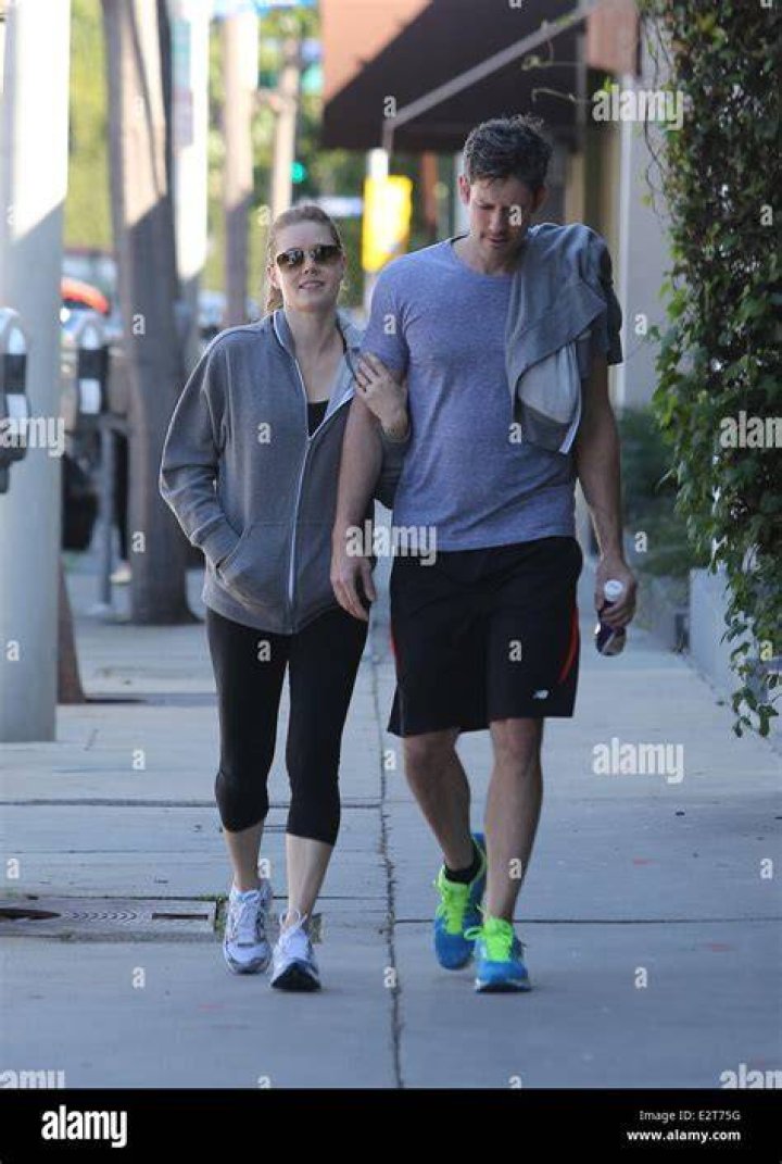 Amy Adams and her partner Darren Le Gallo seen their fitness gear