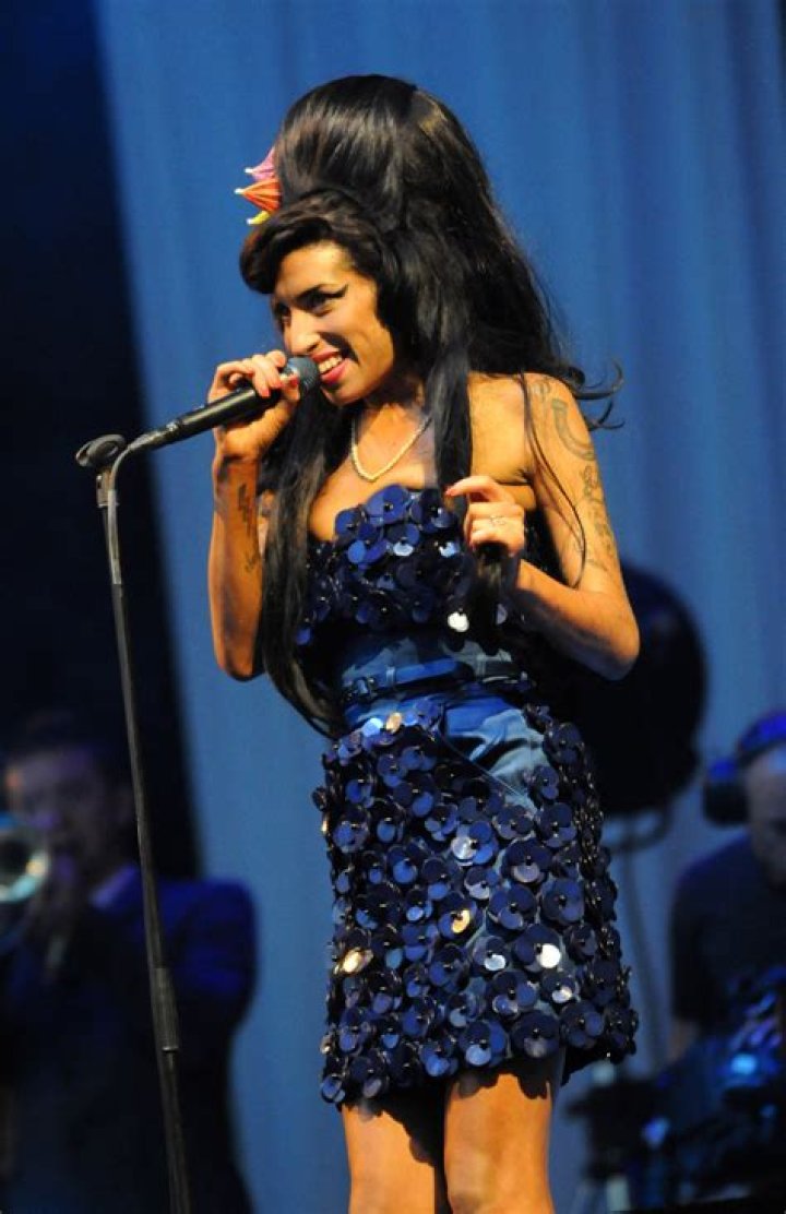 Amy Winehouse is 'resilient and desperate' in unseen portrait taken two