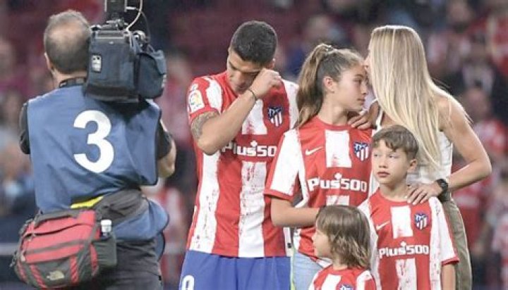Barcelona striker Luis Suarez enjoys table football game with son