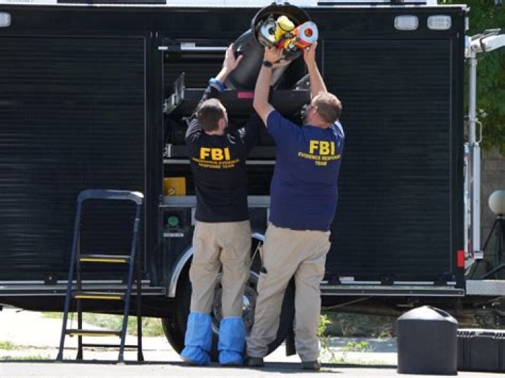 FBI Says Craig Robertson Pulled gun on Agents Before Being Shot