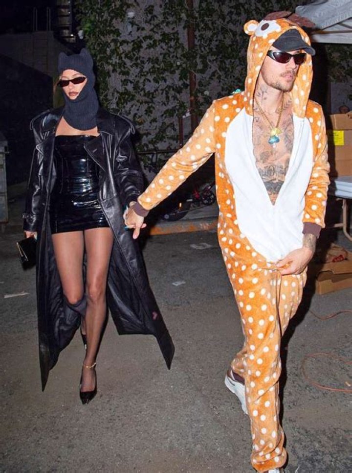Justin Bieber Wears Orange and White Onesie on Date with Wife Hailey