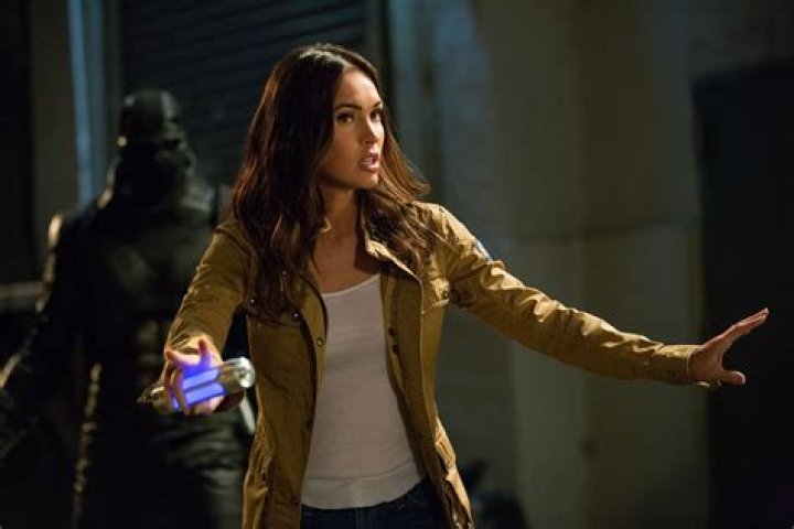 MEGAN FOX as April from the movie Ninja Turltes. Celebrities on Bike