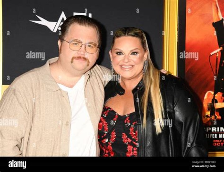 Paul Walter Hauser and Amy Elizabeth Boland at the 2023 Golden Globes