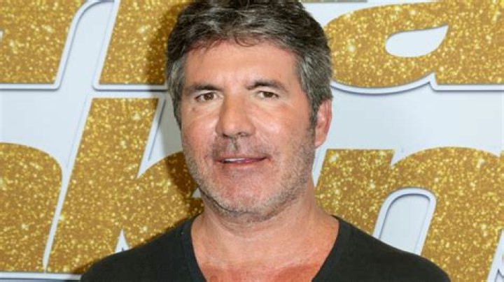 Simon Cowell breaks back while riding electric bicycle around