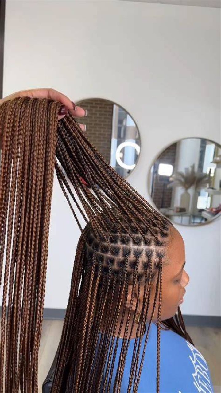 Unwind Your Back Woes With Captivating Box Braids