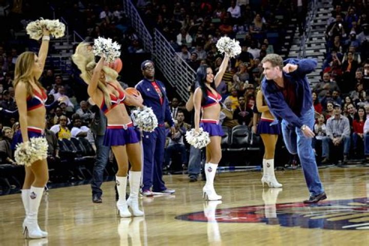 Will Ferrell beans cheerleader with basketball at NBA game